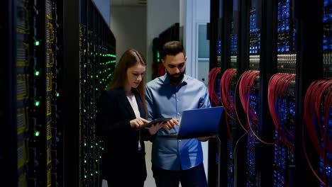 engineers working in a server room
