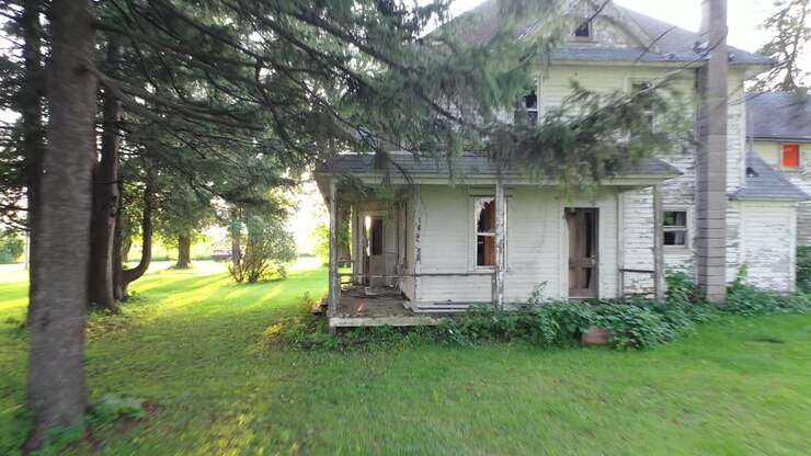 Abandoned Farmhouse in Rural Setting
