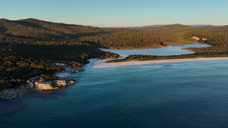 exploring shot of beautiful fires bay, tasmania at sunset, australia