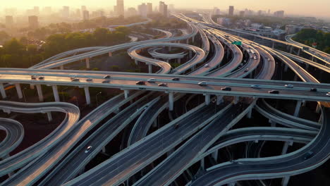 aerial view of a complex highway interchange at golden hour