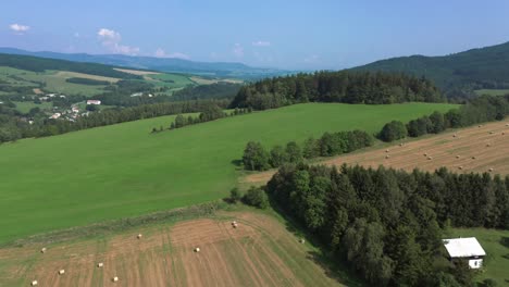 Drone-shot-of-summer-countryside-with-meadows-and-fields-in-Czech-Republic