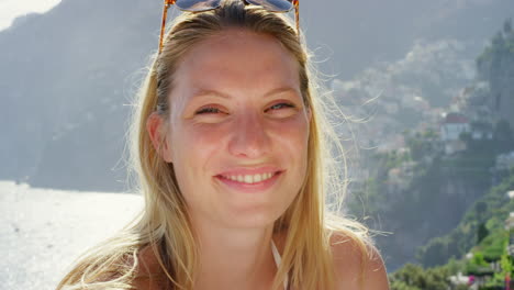 a cheerful young woman laughing during a holiday