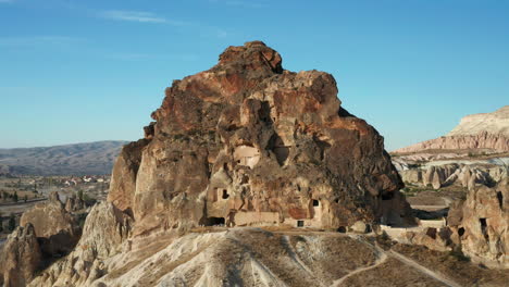 Goreme,-stone-houses-carved-into-mountain-in-Cappadocia-region-of-Turkey