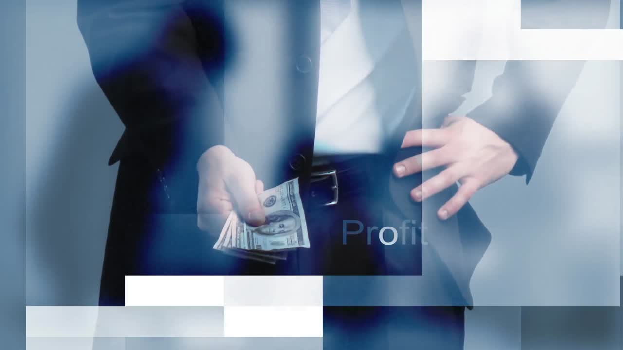 돈을 들고 있는 사업가