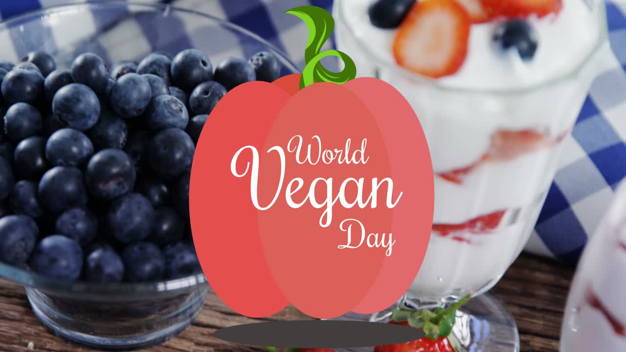 animación del texto del día vegano mundial sobre fruta fresca
