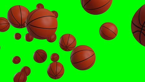 many basketball balls on green chroma key.