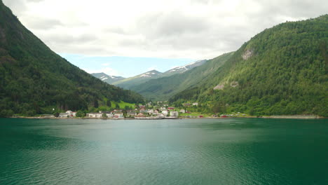 Wonderful-View-Of-The-Village-Of-Geiranger-From-Geiranger-Fjord-In-Sunnmore,-Norway-At-Daytime,-wide-shot