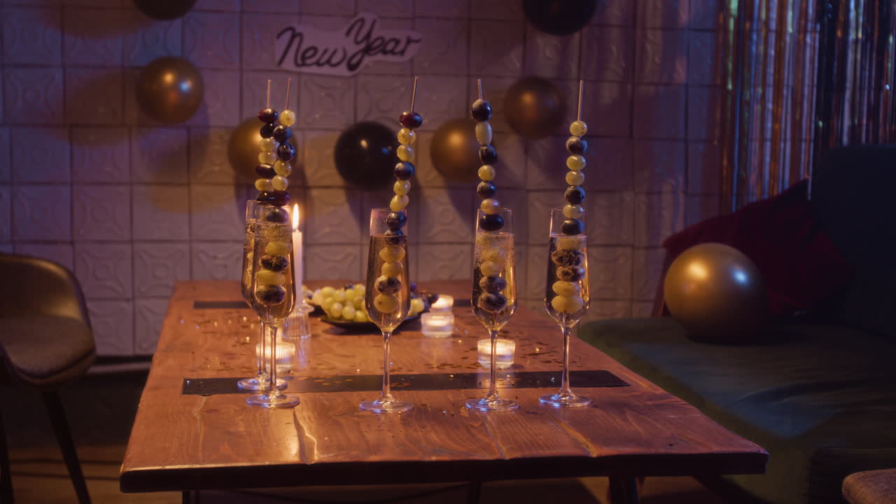 New Year Celebration with Champagne and Grapes