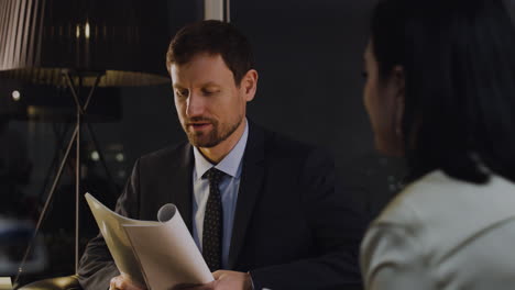 man in suit working late at the office