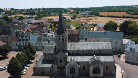 aerial view of a french village with a church