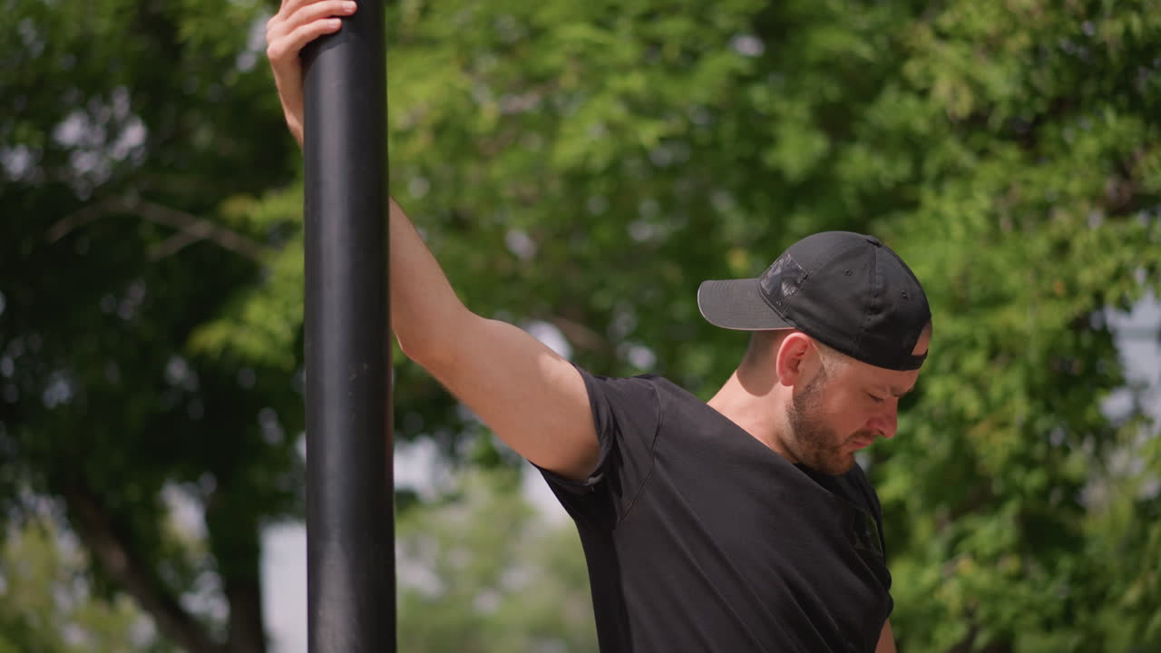 Closeup Of Wrist Strength, Focused Shot Of Forearm And Grip, Caucasian Man Examines Pole Grip In Detailed Study, Closeup Image Highlighting Wrist And Forearm As Man Checks Grip On Pole