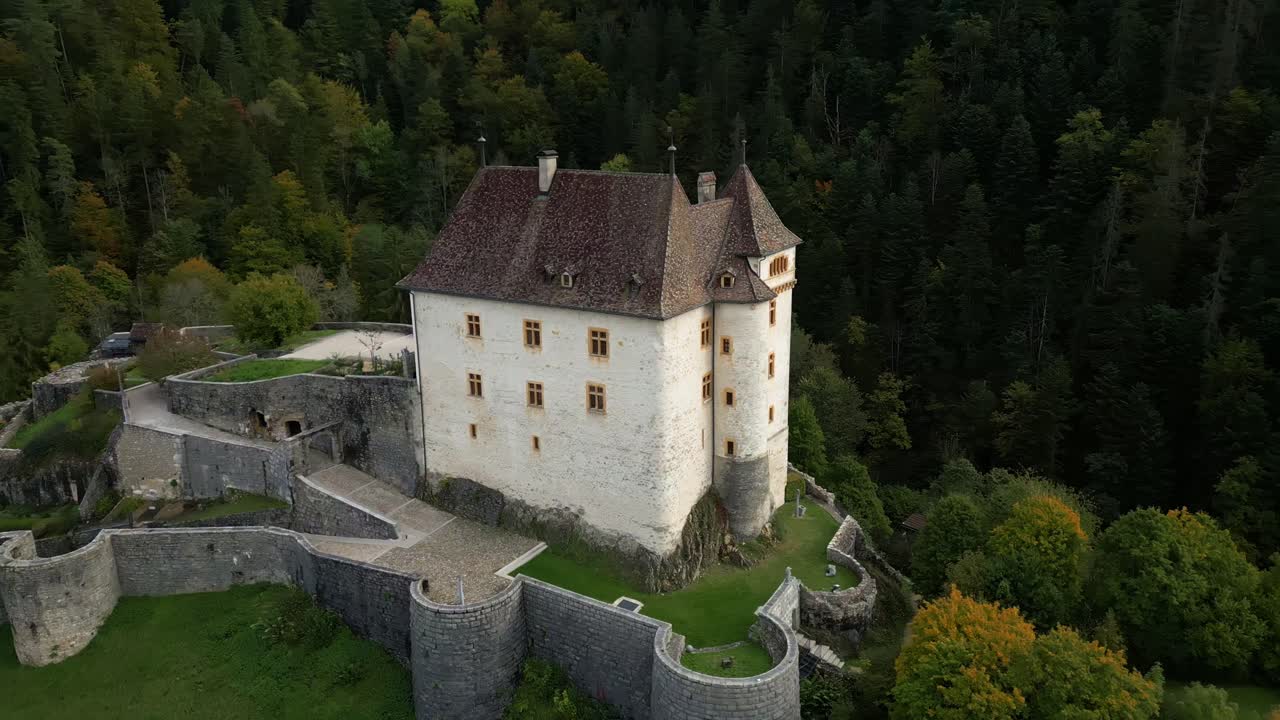 Parallax establishing drone shot of Valangin Castle in Canton of Neuchatel Switzerland