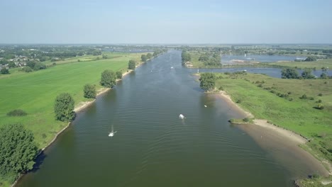 aerial drone view at the meuse river in the netherlands, europe