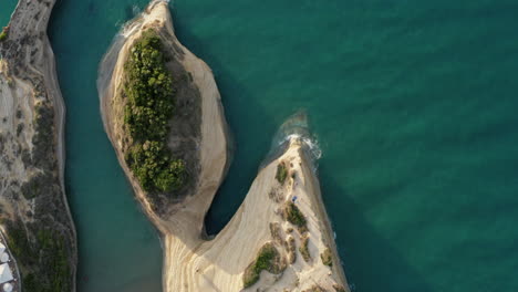 aerial top down shot of the canal d'amour small beach in sidari corfu island, greece