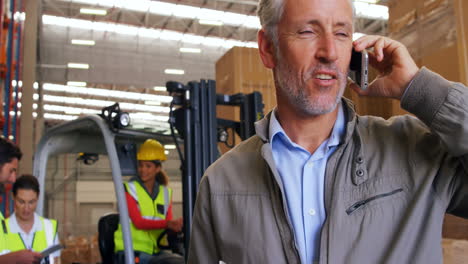 warehouse workers working together