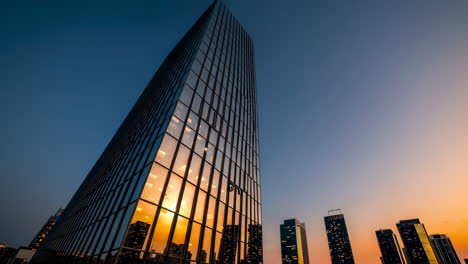 modern skyscraper at sunset