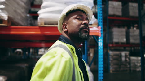 a warehouse worker inspecting inventory