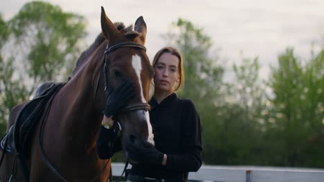 woman and horse at sunset