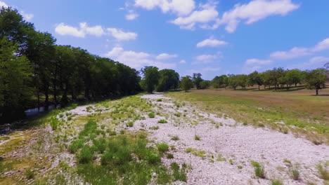 flying over the shallow end of a nice creek in texas