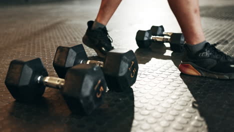 fitness, athlete and closeup of dumbbells in gym