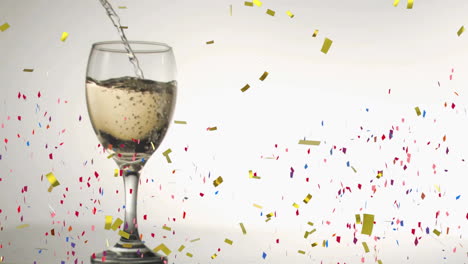 pouring champagne into glass over colorful confetti animation