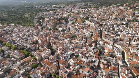 Panning-Aerial-Shot-Of-Dorgali-In-Sardina,-Italy