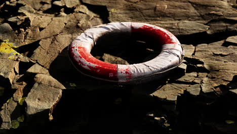 very old abandoned grungy lifebuoy