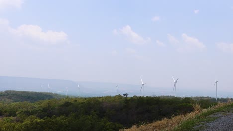 scenic view of wind turbines and expansive landscape