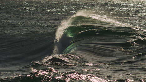 tight barrel breaks with glowing sunlight, glassy water surface and smooth slow form