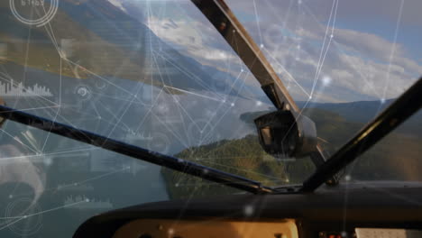 network of connections and data processing against front view of dashboard of private aircraft