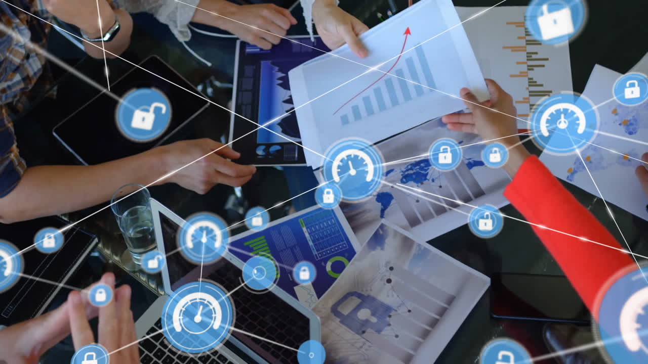 Analyzing charts with digital security icons overlay, business team in meeting room
