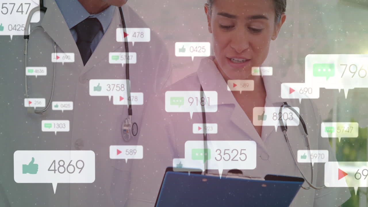Animation of data and icons over diverse doctors