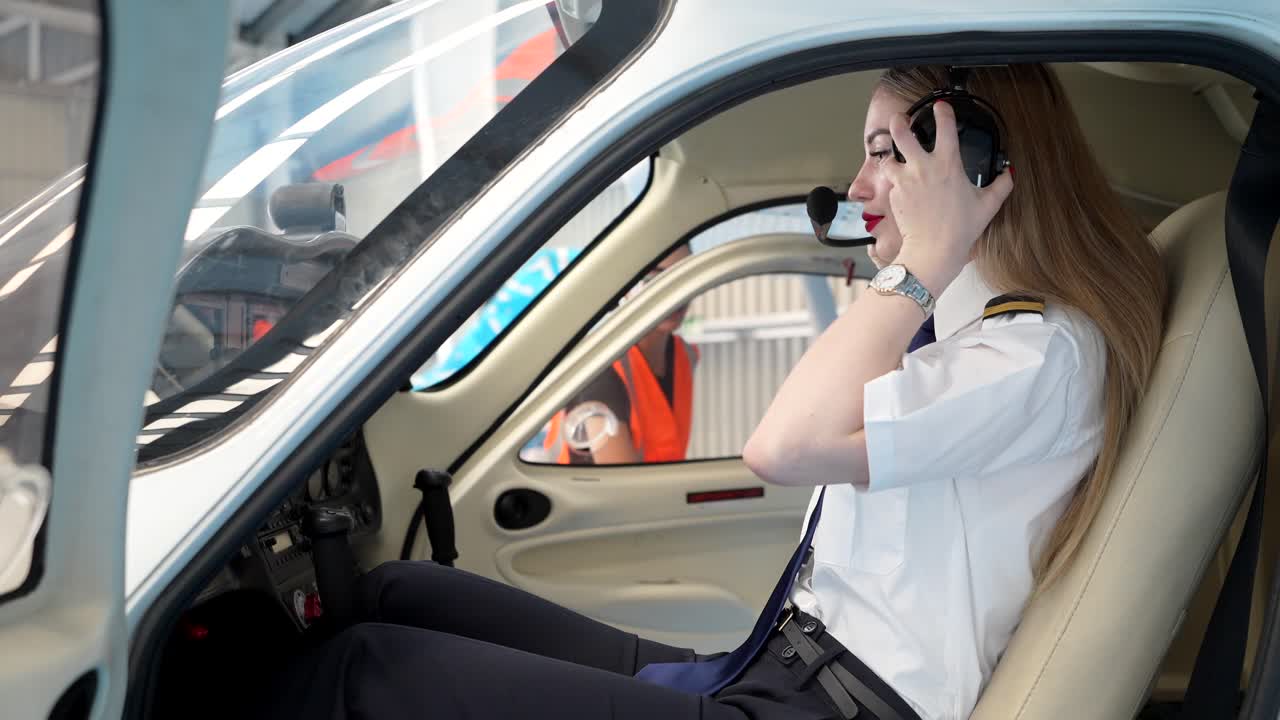 Pilots and Aircraft Engineers in Airplane Cockpit
