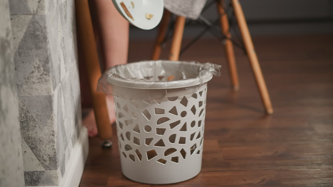 Throwing away fruit peels in the kitchen