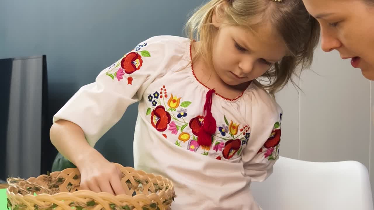 Mother and daughter making a decorative basket together