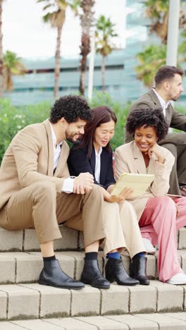 group of diverse business people collaborating outdoors