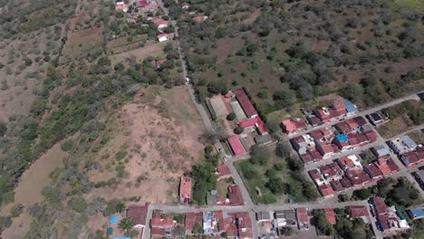 Dolly-tilt-in-central-park-of-a-village-in-Colombia