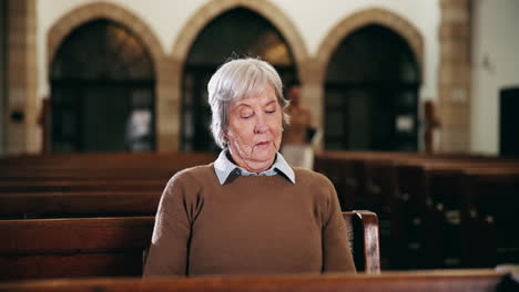 an elderly woman in church