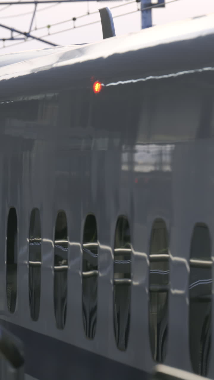 High-speed Shinkansen Japanese train body at sunset