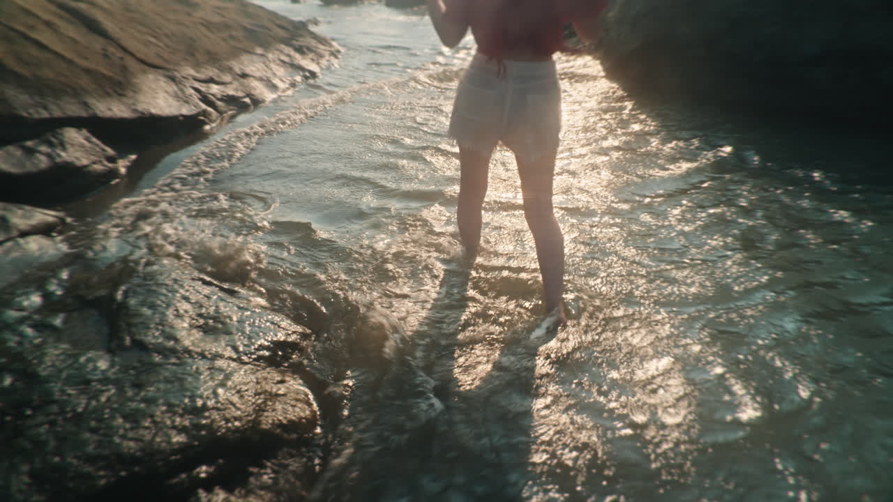 Person walking in a river