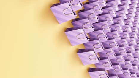 ilustración gráfica de movimiento vertical en 3d de bolsas de compras púrpuras que se desplazan sobre un fondo amarillo