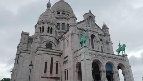 tourists at the basilica of sacre-coeur de montmartre in paris, france. - tilt down shot