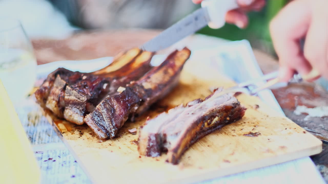 Flavorful and juicy grilled lamb ribs cut into bite sizes, close-up