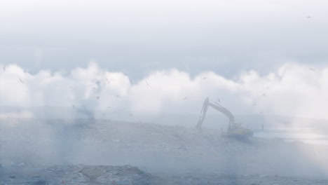 animation of clouds over digger in waste disposal site