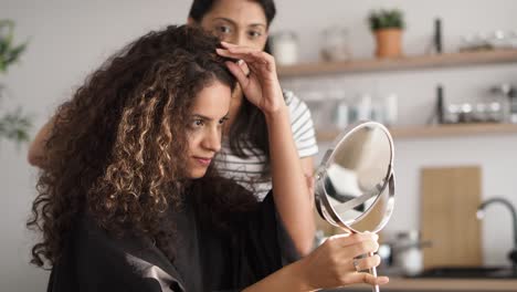 Video-of-female-hairdresser-giving-advice-to-her-client