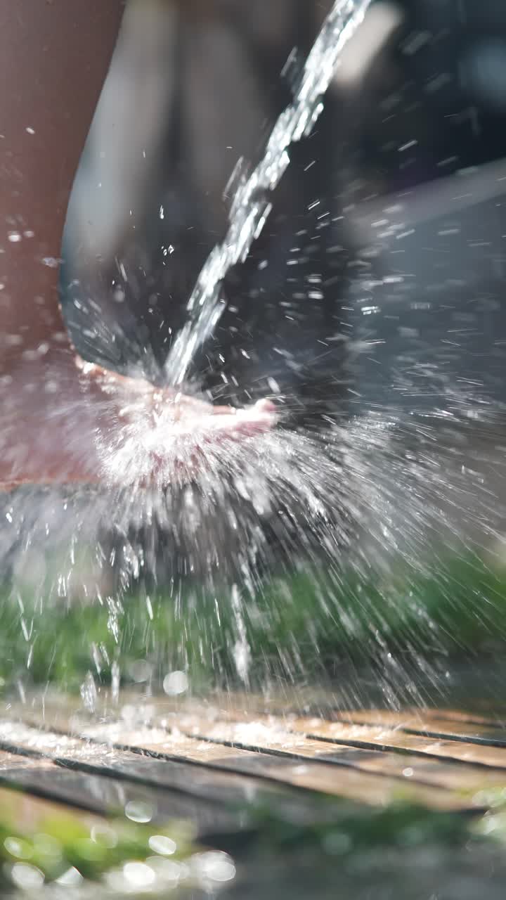 Child playing with water