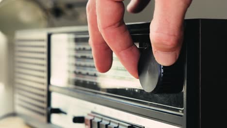 hand tuning a vintage radio