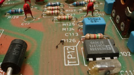 Radio parts of the old amplifier, vintage transistors and chips, hi-fi vintage audio player close up.