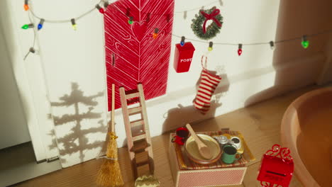 scandinavian elf door with shadow play and festive adornments