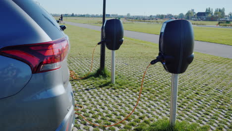 several electric vehicles charging